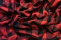 Crumpled Black and Red Fabric in a Cage Royalty Free Stock Photo