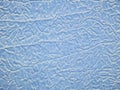 Crumpled blue brocade fabric texture background Royalty Free Stock Photo
