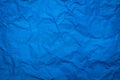 Crumpled of blue paper sheet texture background. Abstract wallpaper in cool tone concept for use in website or wrapping. Royalty Free Stock Photo