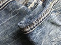 Crumpled boiled stitched retro jeans. Abstract composition.