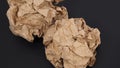 Crumpled brown paper.It is mauled on black background