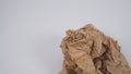 Crumpled brown paper.It is mauled on white background