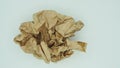 Crumpled brown paper.It is mauled on white blackground