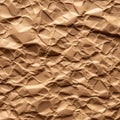 Crumpled brown paper with a rough texture and uneven surface Royalty Free Stock Photo