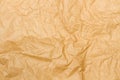 Crumpled brown paper texture in a close up view