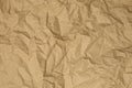 Crumpled brown recycled paper background. Copy space Royalty Free Stock Photo
