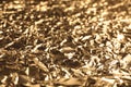 Crumpled gold foil as background, closeup view