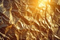 Crumpled gold foil background with reflections