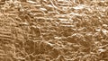 Crumpled gold foil texture background, aluminum wall , metal Royalty Free Stock Photo