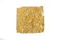 Crumpled gold leaf isolated on a white background