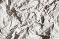 Crumpled gray craft paper texture background. Package wrapping. Old wrapping paper. Baking parchment. Letter template.