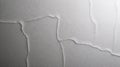 Crumpled gray paper creating abstract shapes and textures