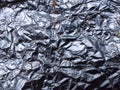 Crumpled gray plastic wrap texture