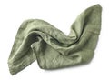 crumpled green cotton napkin