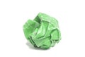 Crumpled green paper ball isolated on white Royalty Free Stock Photo