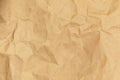 Crumpled kraft paper or cardboard texture for background Royalty Free Stock Photo