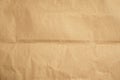 Crumpled kraft paper or cardboard texture for background Royalty Free Stock Photo