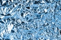 Crumpled light blue foil shining texture background, bright shiny cold icy design, metallic glitter surface Royalty Free Stock Photo