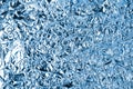 Crumpled light blue foil shining texture background, bright shiny cold icy design, metallic glitter surface Royalty Free Stock Photo