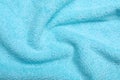 Crumpled blue microfiber cloth as background, closeup Royalty Free Stock Photo