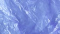 Crumpled Light Blue Plastic Bag Texture with Wrinkles and Shine Background Royalty Free Stock Photo