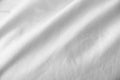 Crumpled messy white blanket untidy, Unmade bed sheet after waking up in the morning texture Royalty Free Stock Photo