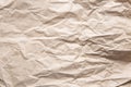 Crumpled old brown yellow paper. Rough old texture. Abstract background with space for text. Aging concept Royalty Free Stock Photo