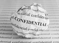 Crumpled paper ball with words Confidential Royalty Free Stock Photo