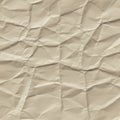 Crumpled paper with a beige hue and visible lines from folding and creasing. The text Royalty Free Stock Photo