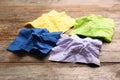 Crumpled paper napkins on wooden background Royalty Free Stock Photo