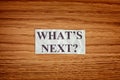 Crumpled paper note with the question What is next Royalty Free Stock Photo
