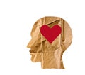 Crumpled paper shaped as a human head and heart on white. Royalty Free Stock Photo