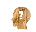 Crumpled paper shaped as a human head and Question mark on white Royalty Free Stock Photo