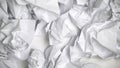 Crumpled paper sheets in office, inefficient material usage, ecological damage