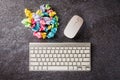 Crumpled paper stick note ball with computer keyboard Royalty Free Stock Photo