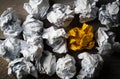 crumpled paper symbolizing different solutions with one standing out Royalty Free Stock Photo