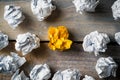 Crumpled paper symbolizing different solutions with one standing out Royalty Free Stock Photo