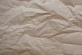 Crumpled paper texture for background. Rumpled kraft paper with copy space