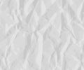 Crumpled paper texture. White battered paper background. White empty leaf of crumpled paper. Torn surface of letter blank. Royalty Free Stock Photo
