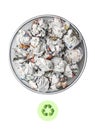 Crumpled papers in garbage bin with recycling sign over white background Royalty Free Stock Photo