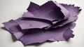 A crumpled pile of purple paper scraps on a white surface Royalty Free Stock Photo