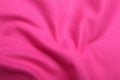 Crumpled pink microfiber cloth as background, closeup Royalty Free Stock Photo