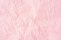 Crumpled pink paper background