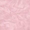 Crumpled pink pastel colour paper texture for background