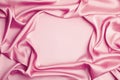 Crumpled pink silk fabric as background, top view. Space for text Royalty Free Stock Photo