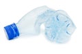 Crumpled plastic bottle isolated over white Royalty Free Stock Photo