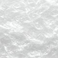Crumpled plastic wrap texture white shiny Royalty Free Stock Photo