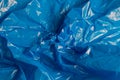 Crumpled polyethilene film abstract background with selective focus