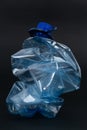 Crumpled recyclable plastic blue water beverage pet bottle Royalty Free Stock Photo