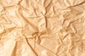 Crumpled recycled brown paper background